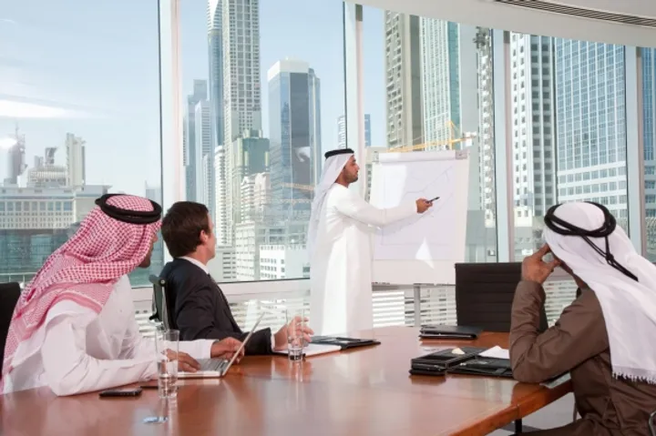 Business presentation with city skyline.