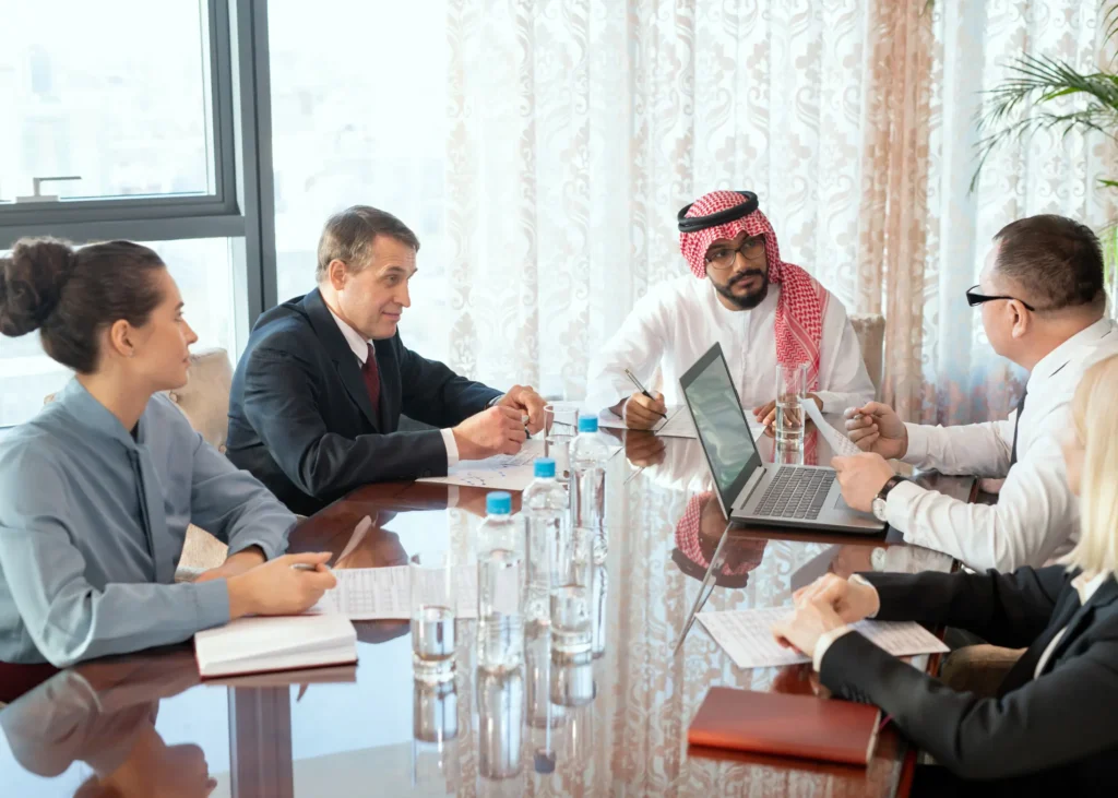 Diverse business team meeting at a conference table